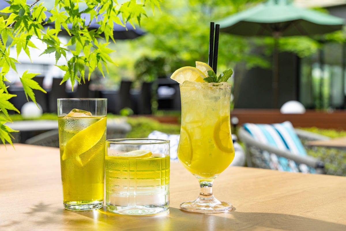Enjoy a refreshing drink in the courtyard under the summer sun.