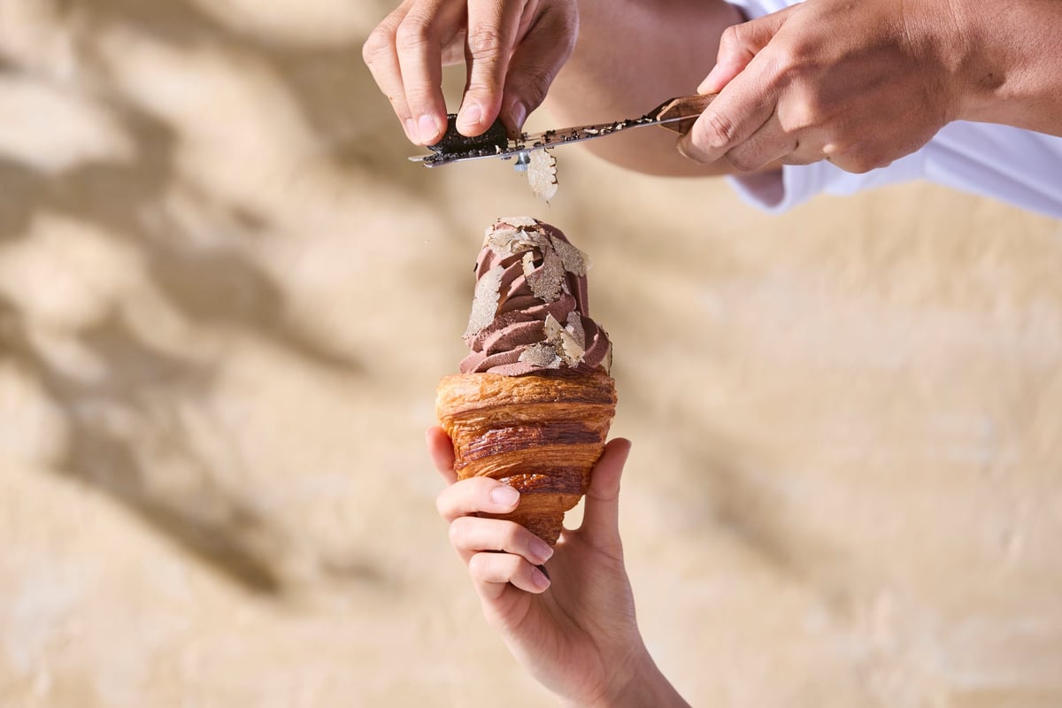 Fresh Australian winter truffle is lavishly shaved over the "Premium Chocolate" soft serve as a topping!