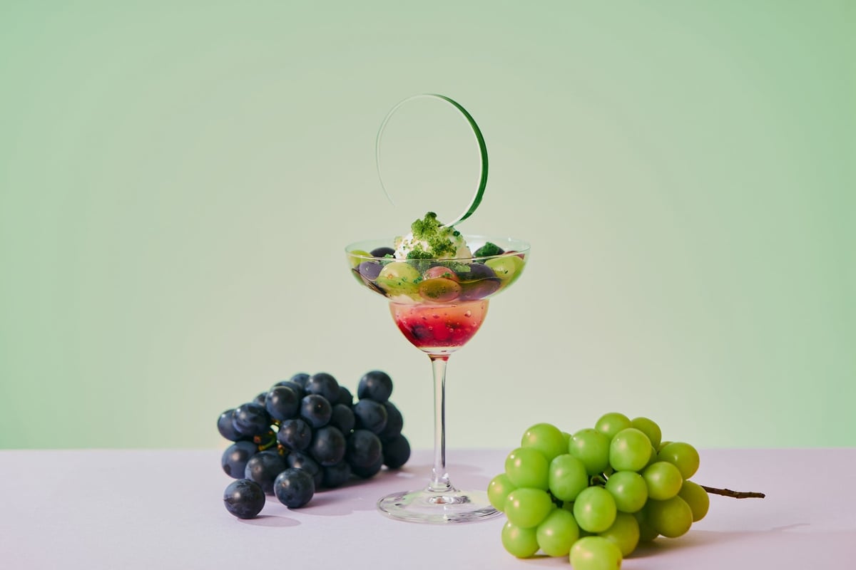 Each scoop reveals new flavors, making the grape parfait a jewel box of bliss until the last bite.