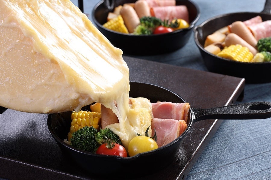 Live Service of Raclette Cheese with Charcuterie and Vegetables