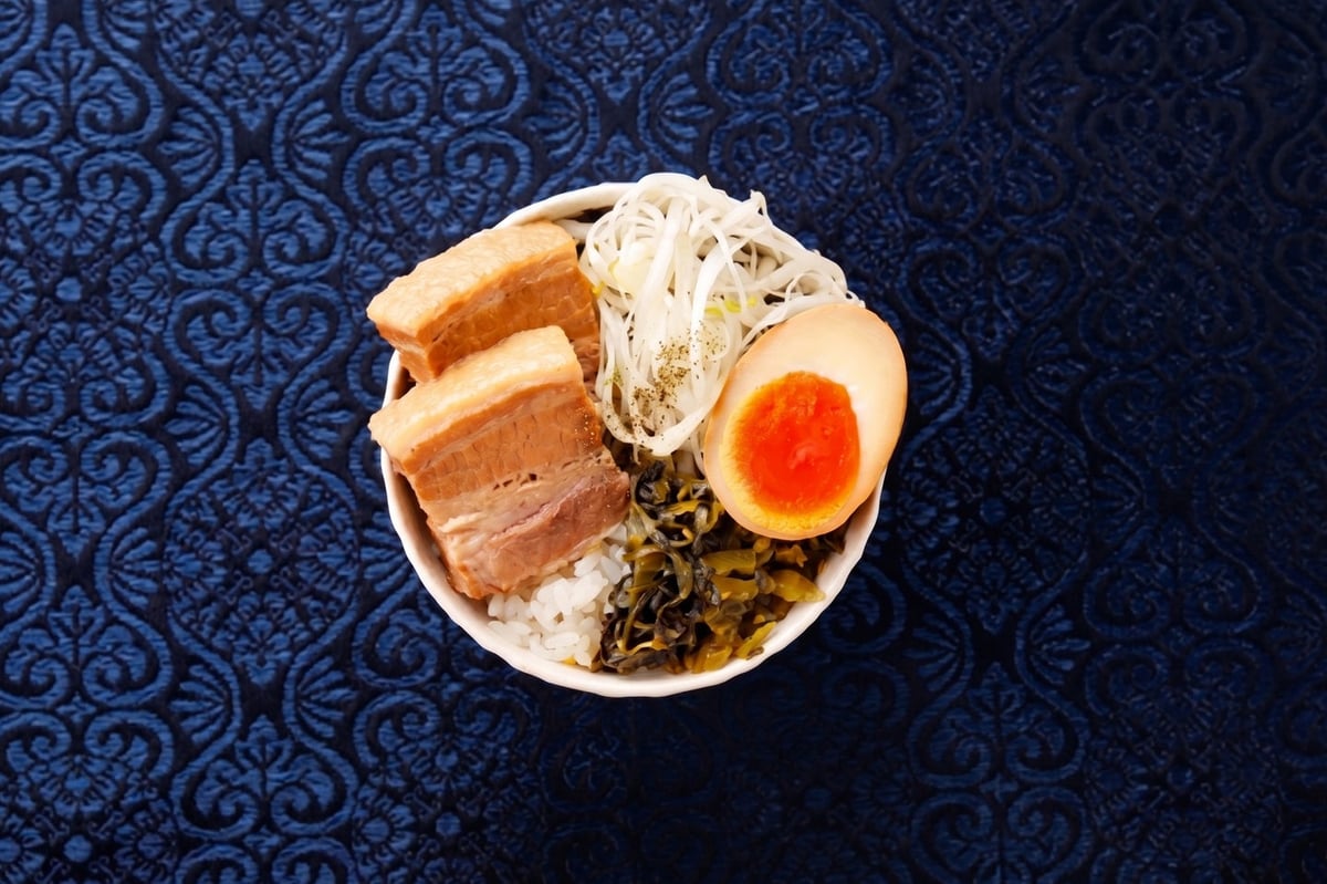 Side menu: Specially seasoned Kakuni Don, soothing Cream Soda, and authentic Tsingtao Beer also available.