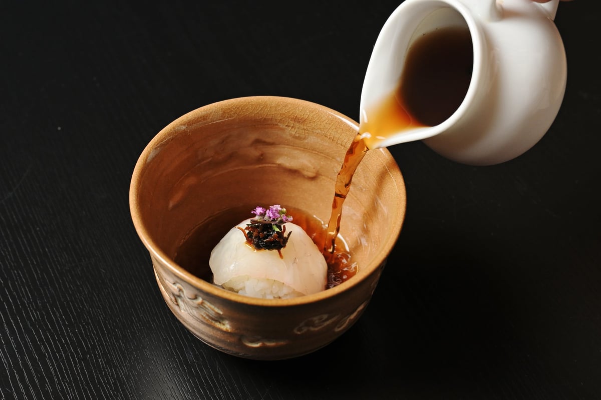 Rice shaped like temari sushi and sea bream sashimi served with fragrant roasted green tea
