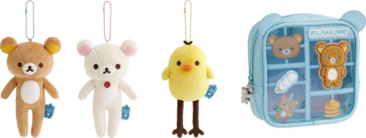 Example items include: Memo Pad — ¥385 (tax included), Clear Folder — ¥198 (tax included), Drop Seal Bits — ¥495 (tax included), Pen Pouch — ¥2,200 (tax included), Plush Pen Pouch — ¥1,980 (tax included), Square Pouch — ¥2,420 (tax included), Key Holder Collection — ¥825 (tax included), Shaka Shaka Acrylic Key Holder — ¥1,320 (tax included), Rigid Card Case — ¥660 (tax included).
