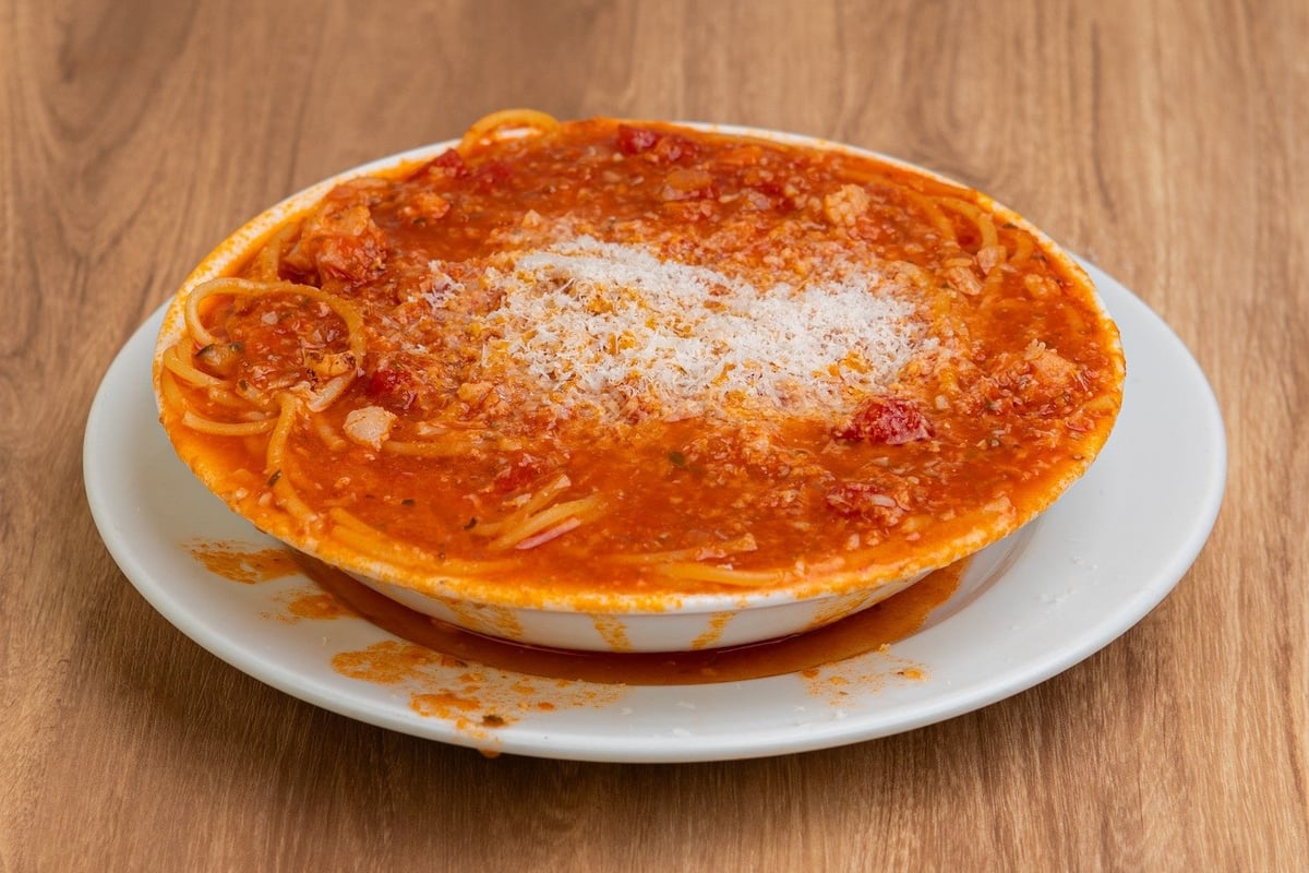 Simple yet popular pasta featuring the rich flavor of sun-ripened tomatoes and aged cheese, highlighting the bounty of the sun.
