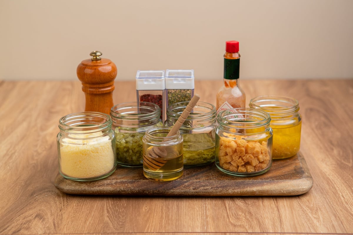 Black pepper / Yuzu chili oil / Honey / Tabasco / Dried mixed herbs / Coarse ground chili / Dill relish / Croutons / Garlic oil / Parmesan cheese