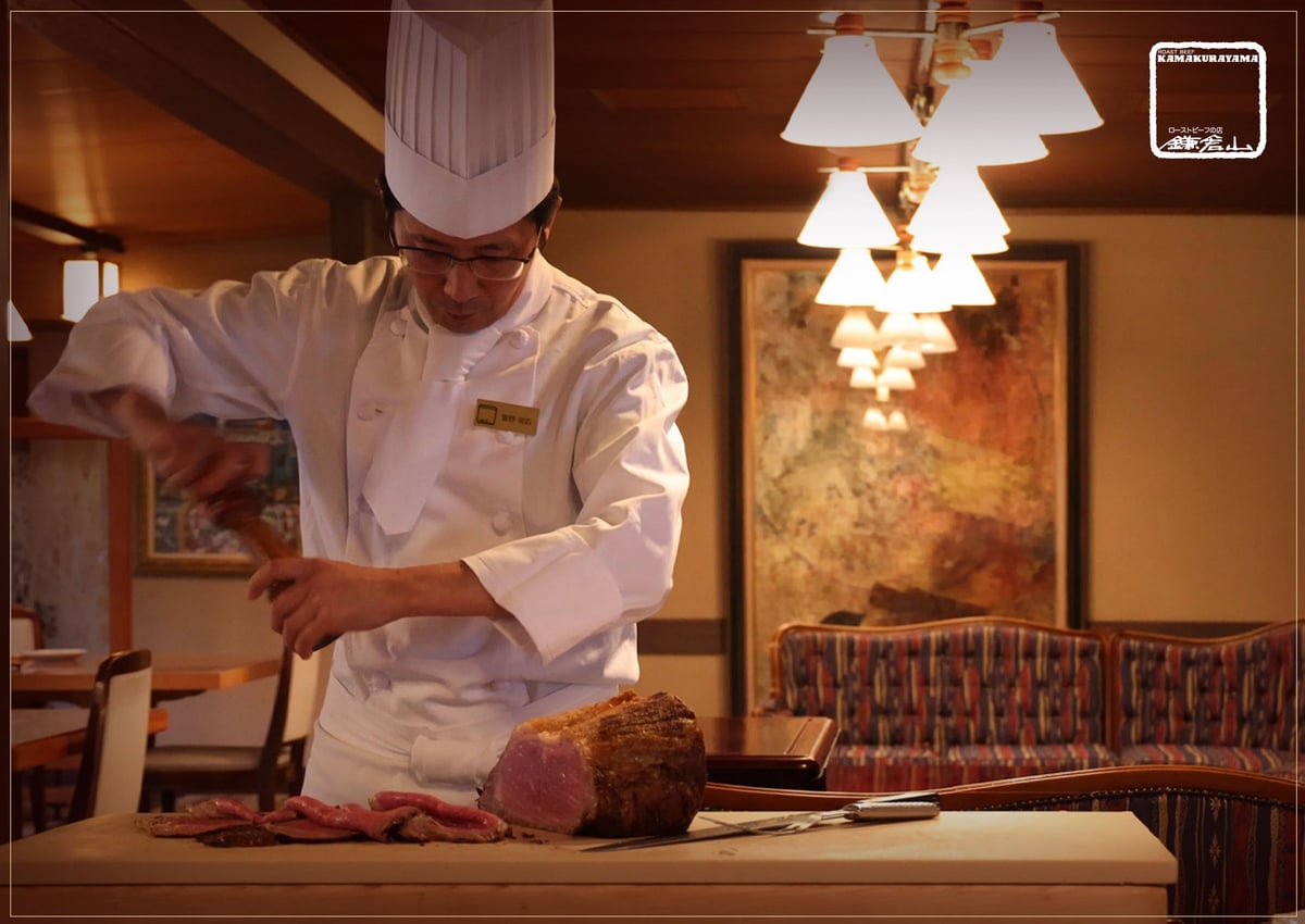 A seasoned chef slices the meat right in front of you, offering a unique restaurant experience.