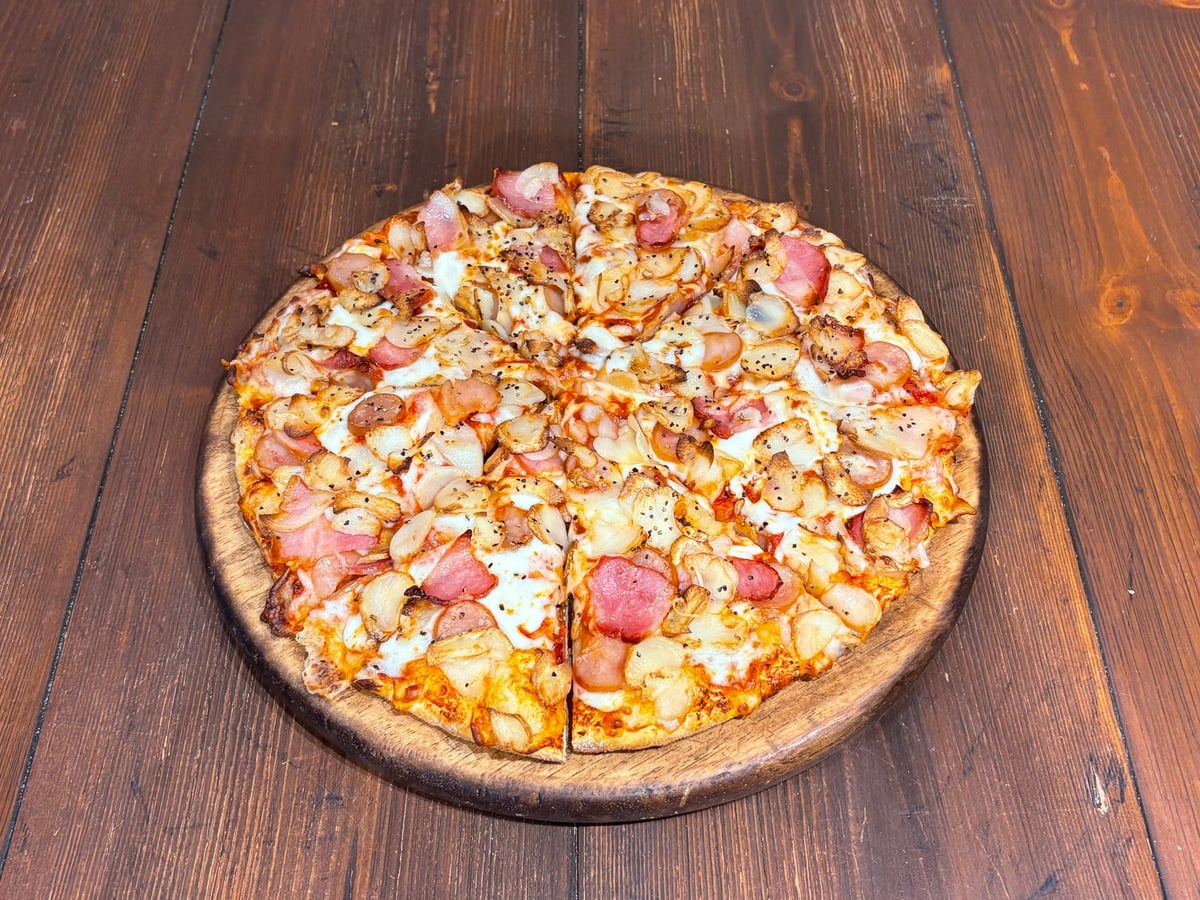 Domino's Pizza in Tokyo Offers Free Small Garlic Master Pizza Delivery