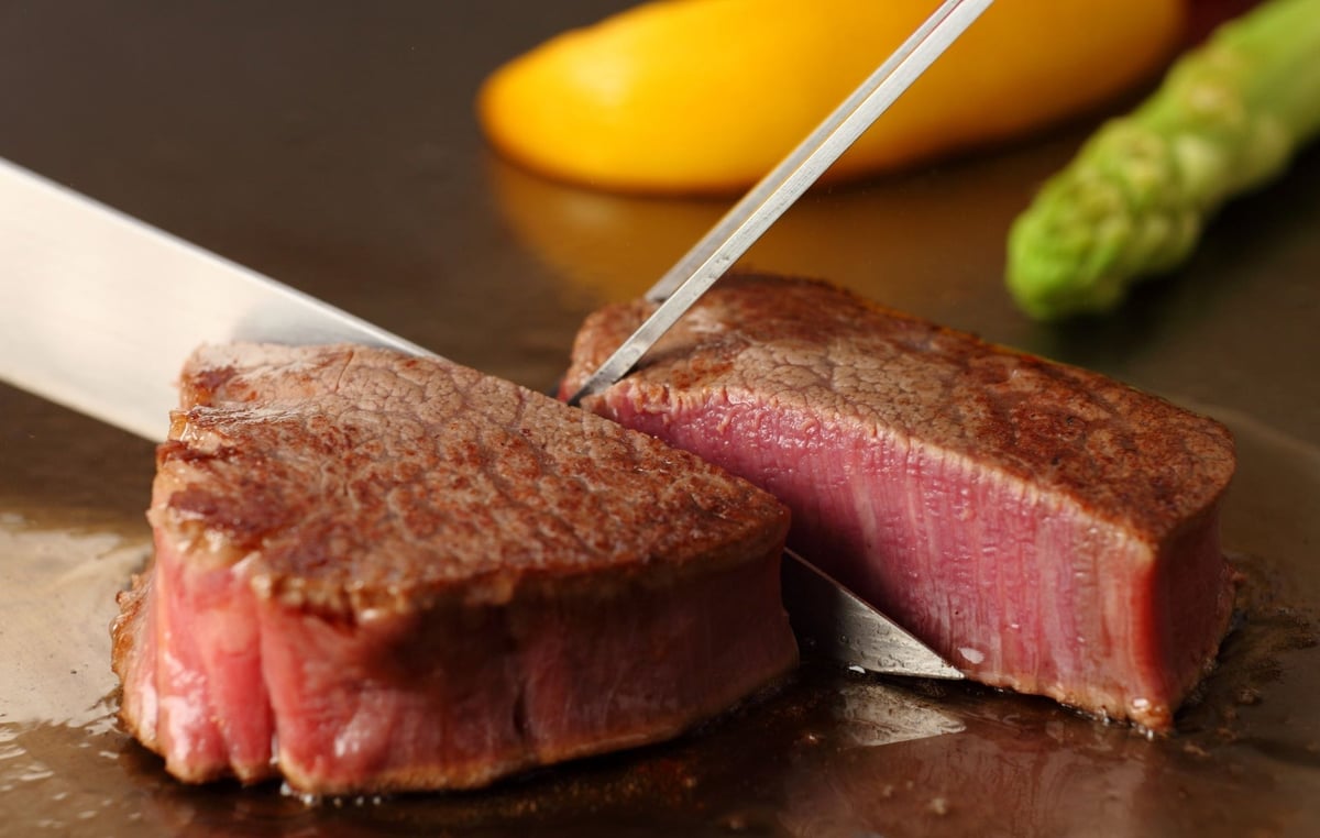 Watch skilled chefs prepare dishes right in front of you.