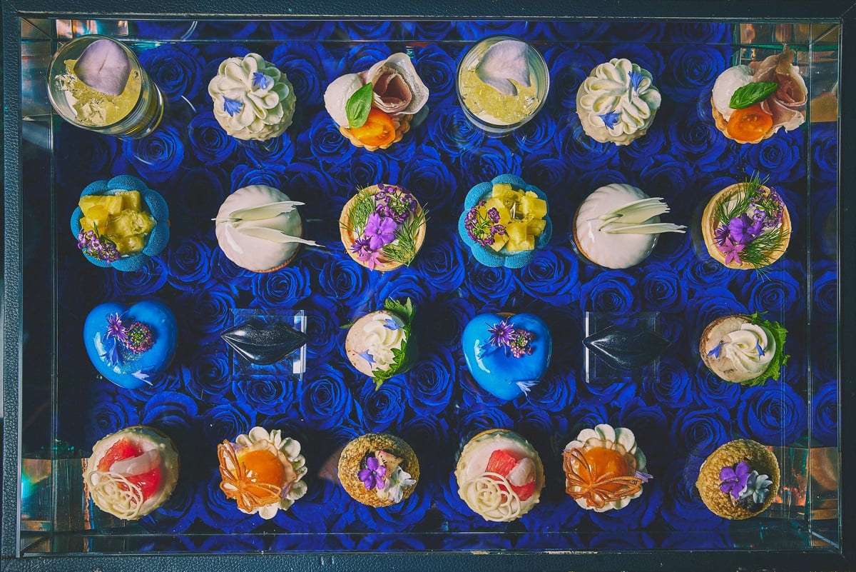 A trunk filled with blue roses.