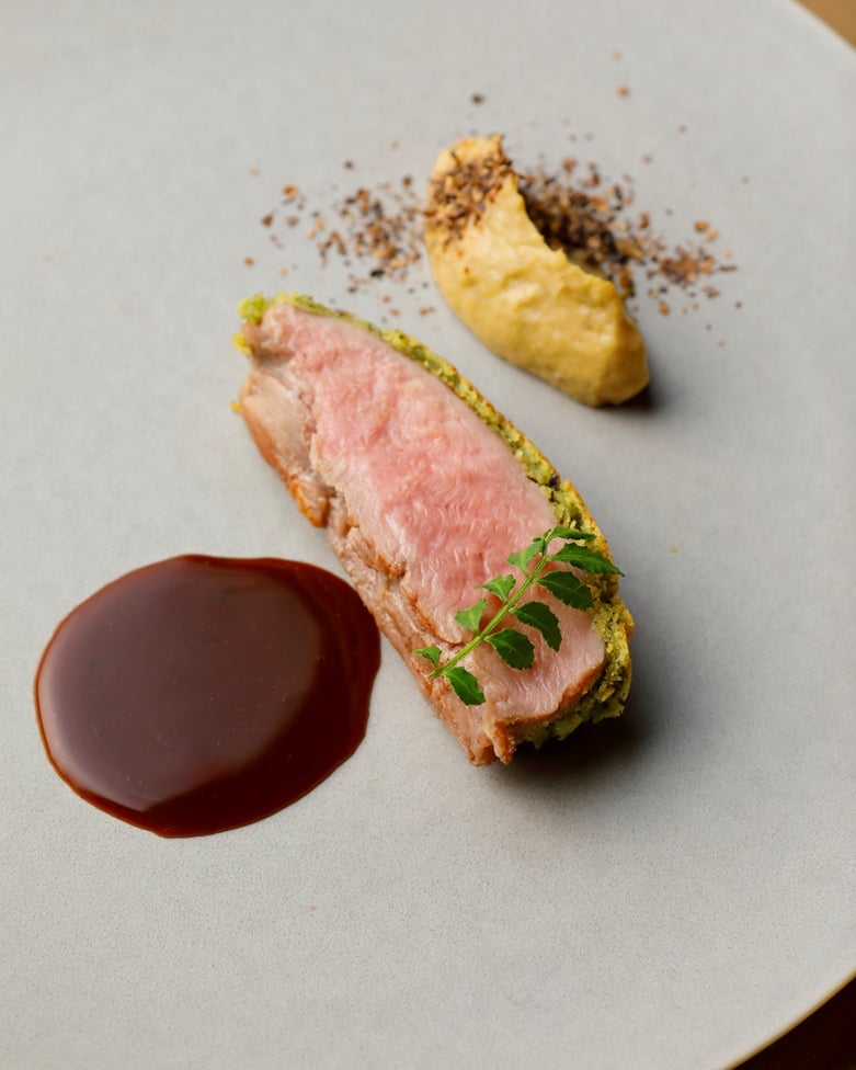 Roasted domestic veal loin with Sichuan pepper Viennoiserie and charcoal-grilled eggplant