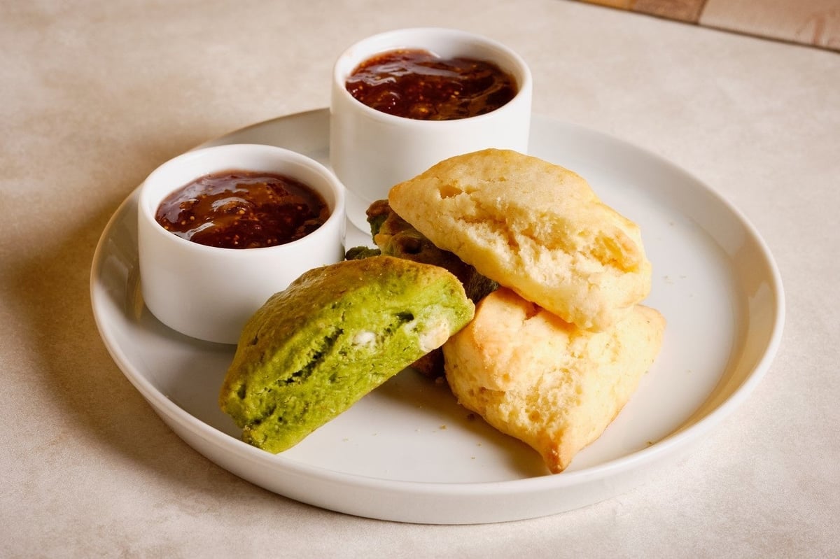 Scone and condiments image.