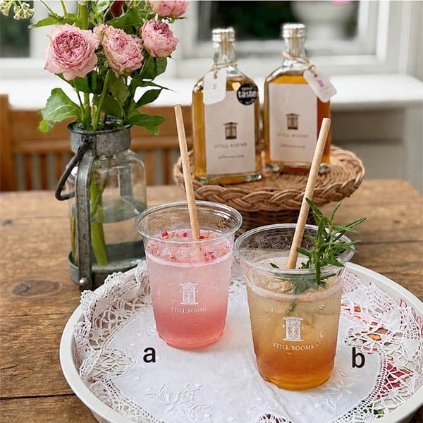 Enjoy a variety of afternoon tea sets, including the Reservation-Only Orange Royal Afternoon Tea for ¥9,900 (tax included). The Blue Moon Tea Salon offers a Savory Lunch Plate for ¥3,850 and a Scone & Cake Plate for ¥2,750, limited to 40 sets daily. From August 8 to 21, the Bake Shop Rotary features a Cake Plate for ¥3,300 and a Savory Plate for ¥3,780, limited to 30 sets each day. At Farler's, try the Landland Bitter Orange Tea with Orange Ice for ¥990. Ishikamakura serves a Lemon Card Eggton Mess Parfait for ¥990. Carkers of London offers a Strawberry Chocolate Milk Tea with Matcha for ¥891. Lu Rooms has Cordial Sodas: Rose Bloom and Elderflower each for ¥880. The Earl Grey Lemon Poppy Seed, Pecan Orange, and Apple Caramel each cost ¥399. Part 1 includes Cornish Split for ¥486 and various scones from 454 to 508 yen. Parlor Made Cafe & Scone House offers Plain Scones for ¥454 and Fruit Scones for ¥508. Cha Tea Tea Ceremony features the Classic Scone at ¥411, and Nikki's Baking Party offers Whole Grain Spelt Scones for ¥432. Ryan Smedley's Cinnamon Roll is ¥399. Eaton Mess Fudge and Milk Chocolate Honeycomb Fudge are each ¥1,296 per 100g. Viola Bake in collaboration with Aphan no Mori offers Welsh Cakes: Apple and Cheddar Cheese each for ¥491. Simpsons serves Fish & Chips (Regular Size) for ¥2,178. Halcyon Days presents a Corgi Enamel Box for ¥121,000 and a Sandringham House Enamel Box for ¥143,000. The Lingam House Gold Crown Mug is ¥20,900, and the Longest Reining Monarch Silk Scarf is ¥74,800. Still Rooms offers Cordial Sodas: Rose Bloom and Elderflower each for ¥880, limited to 40 cups daily.