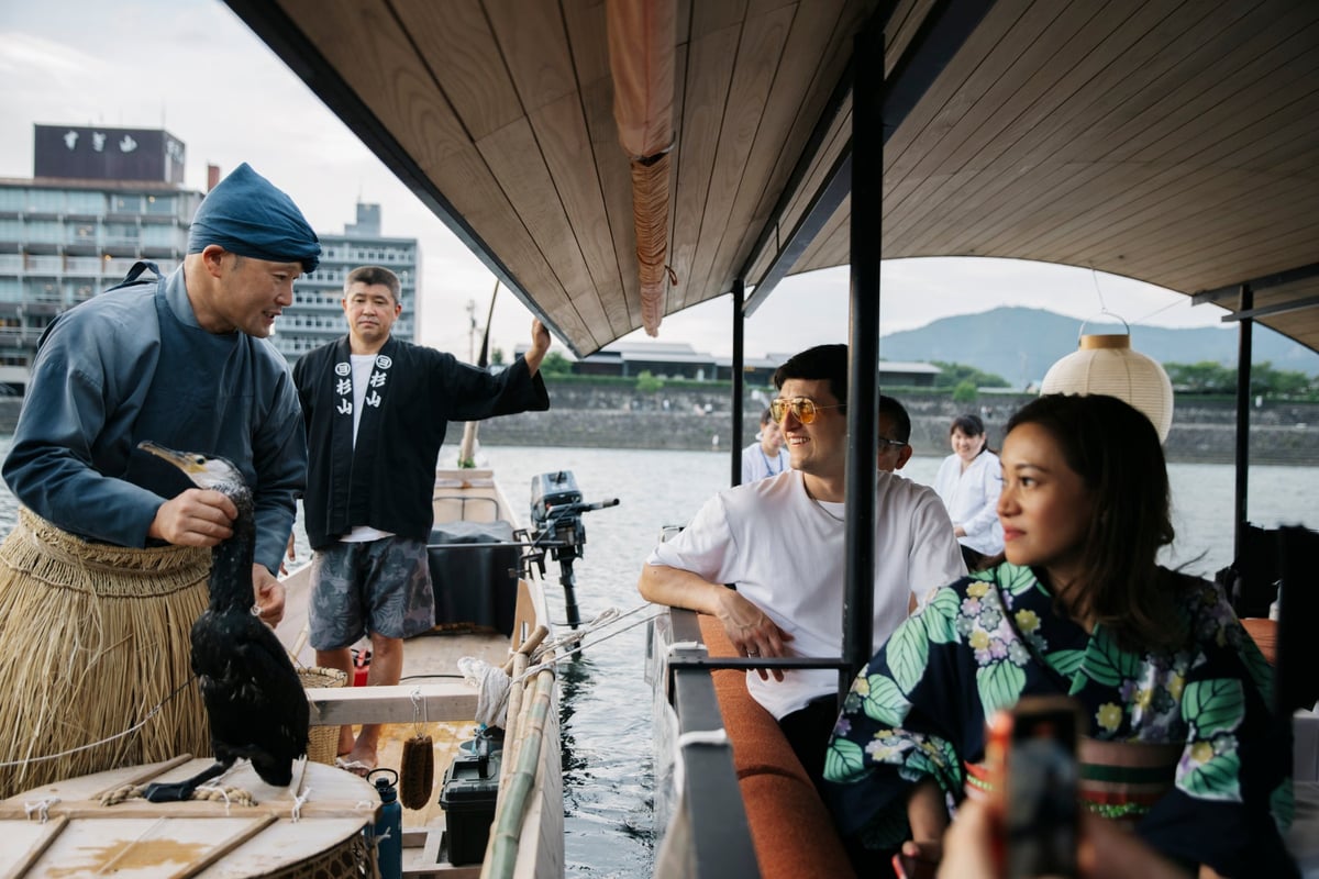 Ukai master explaining cormorant fishing (individual boat tour)