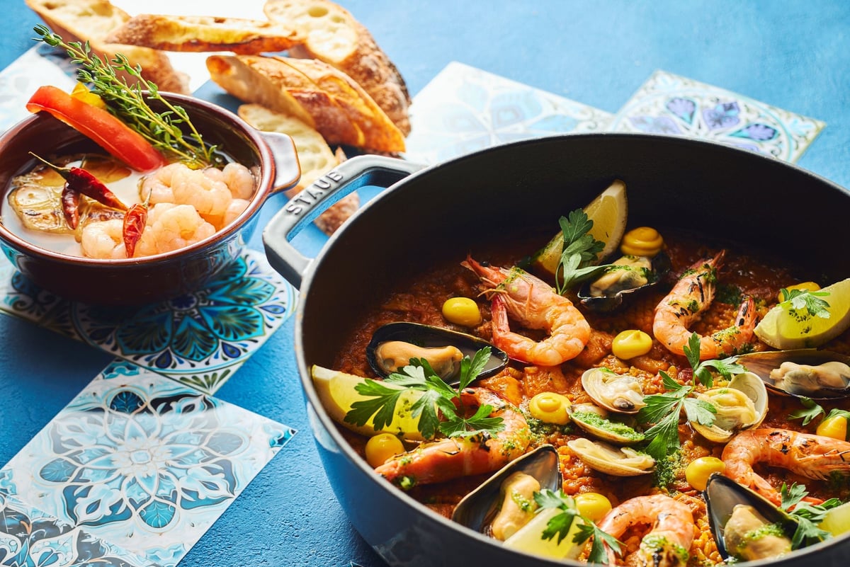Mediterranean and Spanish cuisine-themed buffet "Flavors of Spain" featuring Paella Valencian style and Steamed Egg Custard with Shrimp Ajillo *Please note this is an image. Actual menu items may differ.