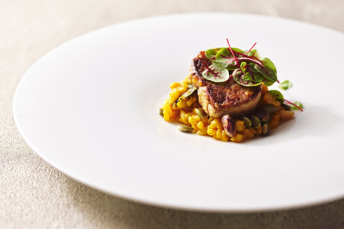 Foie Gras Sauté with Pumpkin and Autumn Mixed Nuts Risotto *Please note this is an image. Actual menu items may differ.
