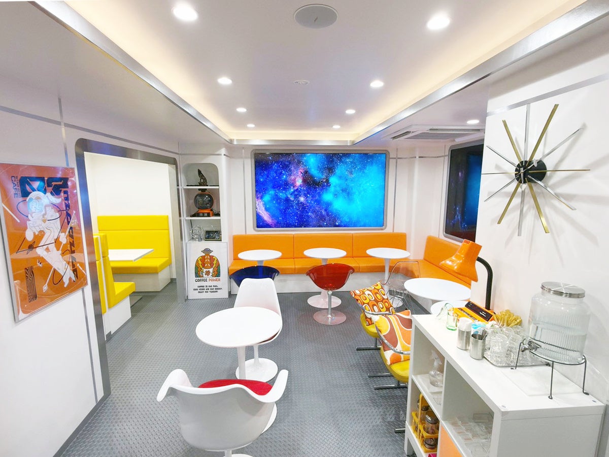 The interior of 07-MODULE designed with a retro-future/space age theme.