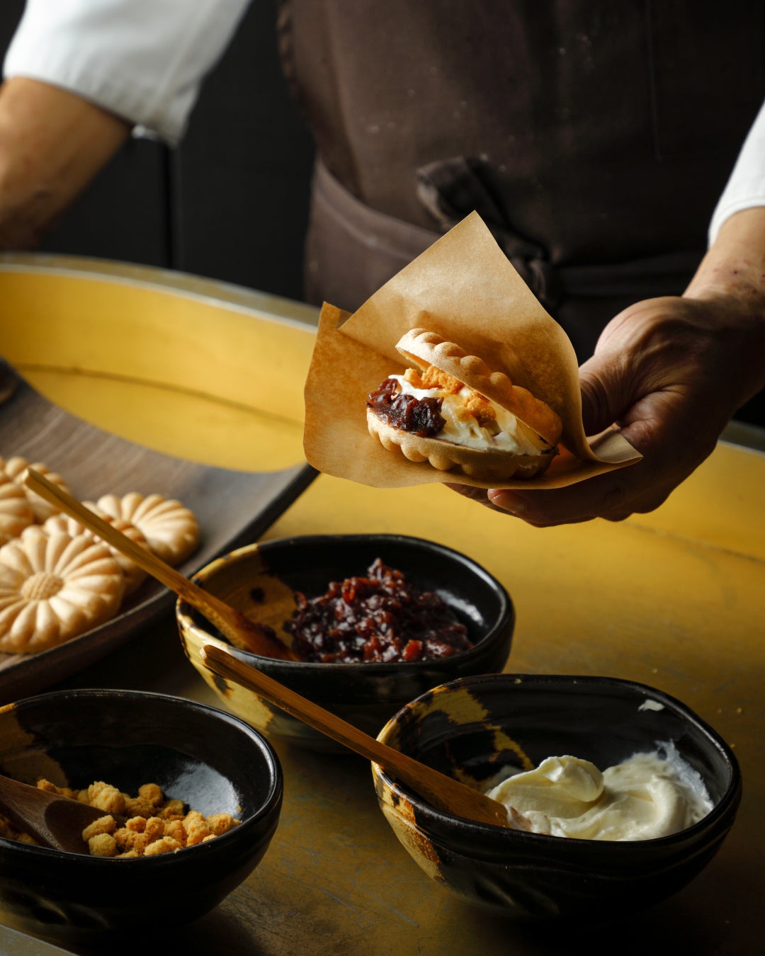 Choose your condiments and watch as Aman Kyoto's special monaka (October) is finished right before your eyes.