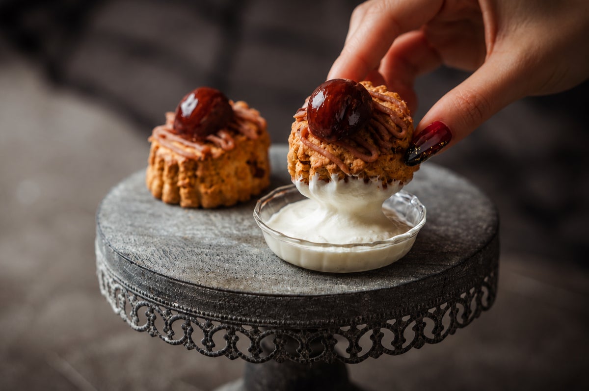 <Chestnut Scone> Fragrant, flaky scone with a subtle chestnut aroma, topped with simmered chestnuts and served with cheese cream, perfect for an autumn tea time.” class=”wp-image-41253″>
<figcaption class=