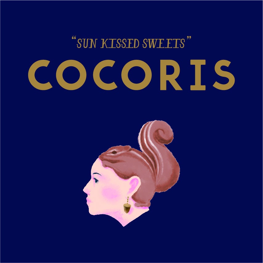 “SUN KISSED SWEETS” - “Sweets that enjoy the nuts bathed in the sun” CoCoRiss uses plenty of well-grown nuts, capturing their natural deliciousness in a luxurious confection. The emblem is a girl with a squirrel hair, who loves nuts.