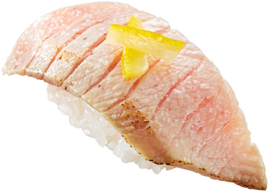 In-store sliced Otoro with direct flame sear and yuzu for ¥173 per piece.