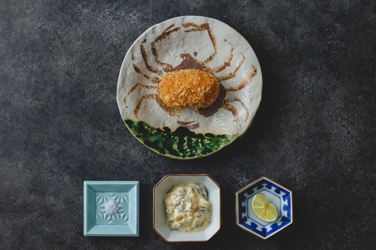 Their signature 'Crab Croquette' is served with tartar sauce made from salt and pickles, and yuzu citrus.