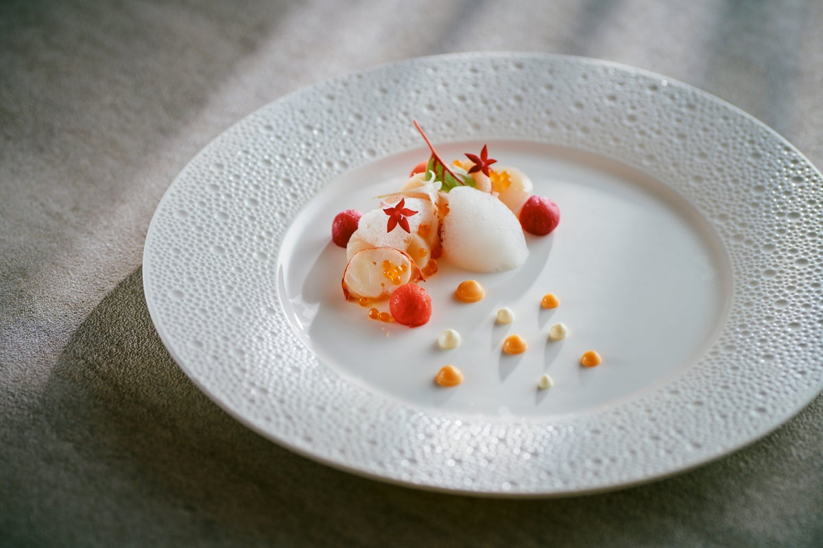 Omar shrimp and scallops Mi-Cuit with Coquille sauce and champagne emulsion