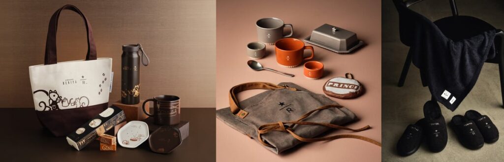 The image features a variety of Starbucks Reserve merchandise, including the Soup Mug in Gray or Light Brown, each priced at ¥3,700 (tax included). Also shown are the Reserve Mini Bowls in Gray or Light Brown, each costing ¥1,600 (tax included). The lineup includes the Reserve Butter Dish in Gray for ¥6,400 (tax included). Inspired by the shape, the Reserve Soup Spoon is available for ¥880 (tax included). The collection also features the Reserve Cafe Apron in Corduroy Gray, priced at ¥8,500 (tax included). To express the coffee world in detail, there's the PRINCI Pocketable Tote at ¥2,800 (tax included). The Reserve Bakune Blanket, which can be stored away, costs ¥15,000 (tax included). Lastly, the Reserve Room Shoes in Black S/M are available for ¥15,000 each (tax included).