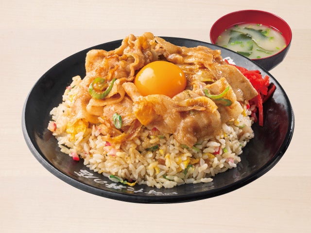 Enjoy our classic stir-fried rice dishes, including the 'Stamina Fried Rice' for ¥1,209 (tax included ¥1,330), which combines garlic-flavored stamina-yaki with a rich egg yolk. The 'Karaage Fried Rice' is available for ¥1,028 (tax included ¥1,130), featuring two pieces of stamina fried chicken paired with fragrant fried rice. For a richer flavor, try the 'Tamago Don' at ¥891 (tax included ¥980), or the 'Yaki Buta Fried Rice' for ¥1,028 (tax included ¥1,130). The 'Tsukimi Fried Rice' with egg yolk is priced at ¥937 (tax included ¥1,030), adding a mellow richness. Our menu also offers set options, such as the 'Ramen Set' with any main dish for an additional ¥355 (tax included ¥390).