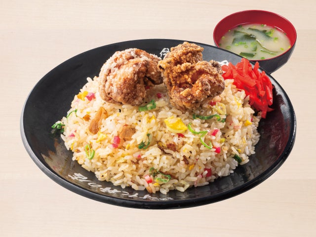 Enjoy the classic stir-fried rice, 'Chahan,' priced at ¥846 (tax included ¥930). For a hearty twist, try the 'Stamina Chahan' with garlic-yaki and egg yolk for ¥1,209 (tax included ¥1,330). The flavorful 'Karaage Chahan' with two pieces of stamina-style fried chicken is available for ¥1,028 (tax included ¥1,130). For a rich taste, the 'Tsukimi Chahan' topped with a raw egg yolk is offered at ¥937 (tax included ¥1,030). These dishes are perfect for satisfying your appetite with bold flavors.
