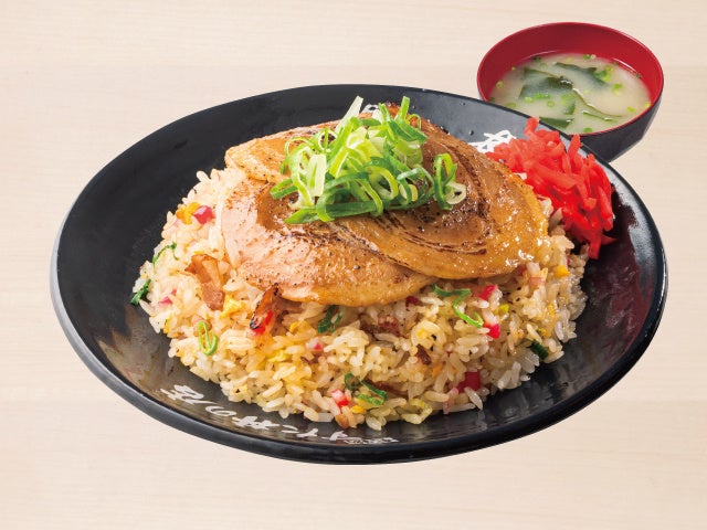 Enjoy the classic stir-fried rice with toppings like the Yakibuta Chahan for ¥1,028 (tax included ¥1,130), or try the Omurice for ¥1,209 (tax included ¥1,330). The Tanmen Chahan, combining stir-fried noodles and egg yolk, is available for ¥1,209 (tax included ¥1,330). For a flavorful twist, the Kimchi Chahan is priced at ¥937 (tax included ¥1,030). You can also add a ramen set to your main dish for an extra ¥355 (tax included ¥390). Don't miss the Tokusei Spicy Stir-fried Rice for ¥891 (tax included ¥980), or the simple yet satisfying Chahan for ¥846 (tax included ¥930). The Karaage Chahan, featuring two pieces of seasoned fried chicken, costs ¥1,028 (tax included ¥1,130), and the Tsukimi Chahan with a raw egg yolk is ¥937 (tax included ¥1,030).