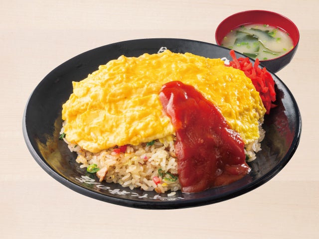 Enjoy the classic stir-fried rice with rich flavors, priced at ¥846 (tax included ¥930). You can also try the special stir-fried rice with garlic-yaki and egg yolk, called 'Stamina Chahan,' for ¥1,209 (tax included ¥1,330). For a hearty meal, the 'Karaage Chahan' with two pieces of stamina fried chicken is available for ¥1,028 (tax included ¥1,130). The 'Tsukimi Chahan,' topped with a raw egg yolk, costs ¥937 (tax included ¥1,030), adding a creamy richness to the savory rice. For a fluffy twist, the 'Omu Chahan' with a soft omelet is priced at ¥1,209 (tax included ¥1,330).