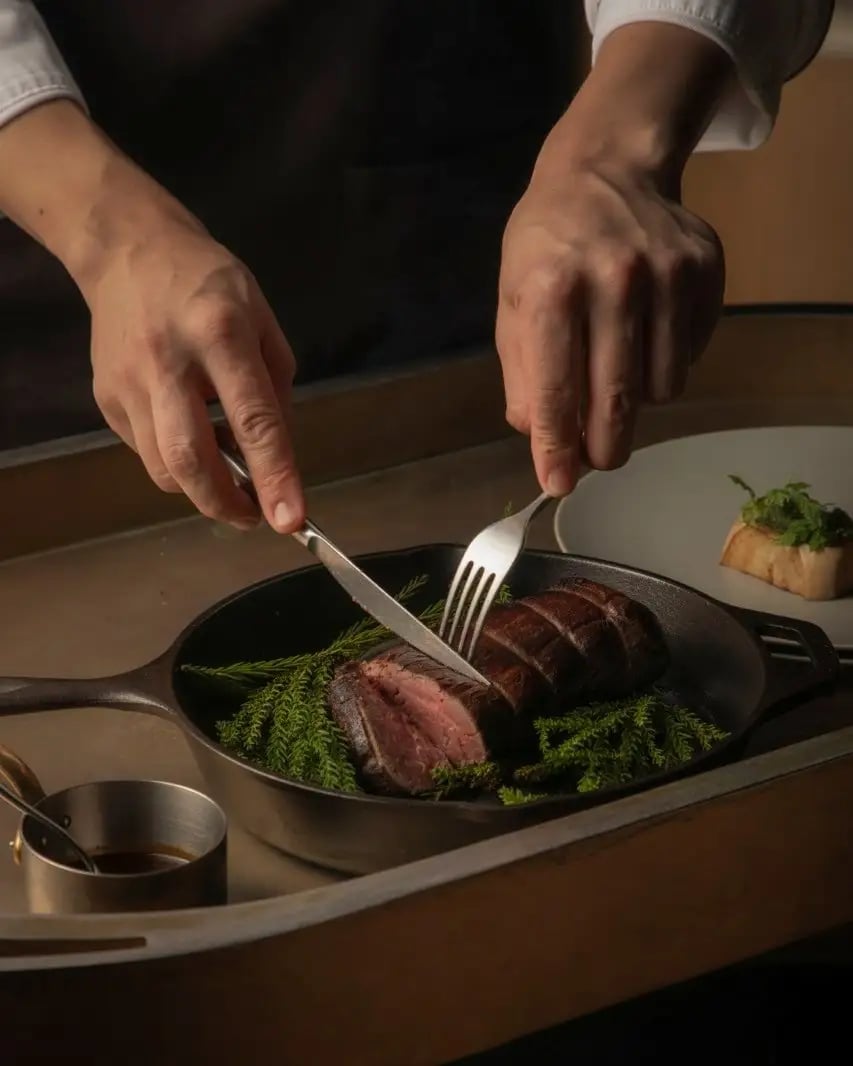 Sustainable black Wagyu fillet carefully sliced and served by the chef.