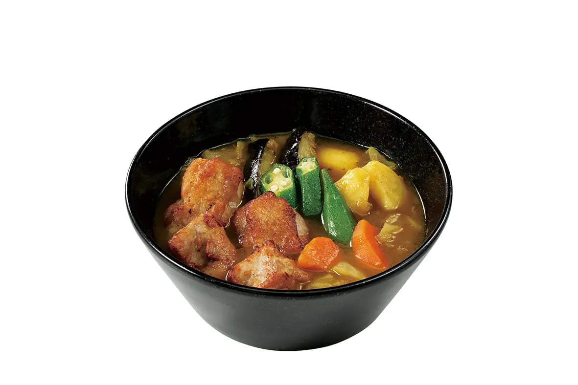 This product image is an illustrative photo taken to clearly show the ingredients for Roast Chicken Soup Curry — ¥1,080 (tax included ¥1,188).