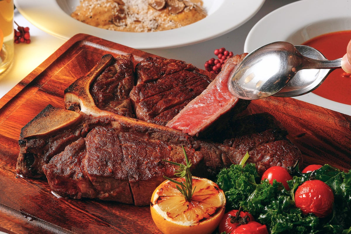 USDA Prime T-Bone Steak: Served with caponata and mashed potatoes. Enjoy the robust flavor and natural taste of USDA Prime beef T-bone steak, a main dish representing IL LUPINO PRIME. Accompanied by flavorful caponata and smooth mashed potatoes.