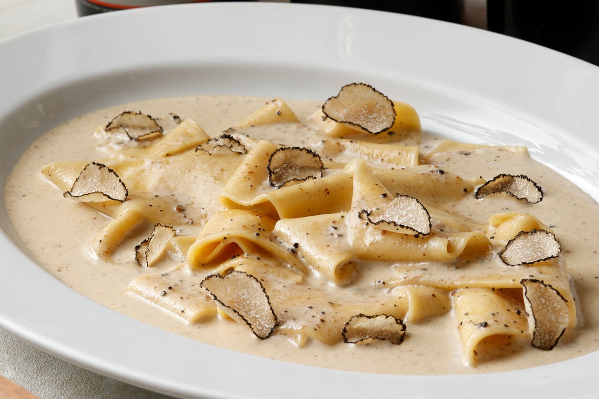 Homemade Pappardelle with Truffle Cream Sauce.