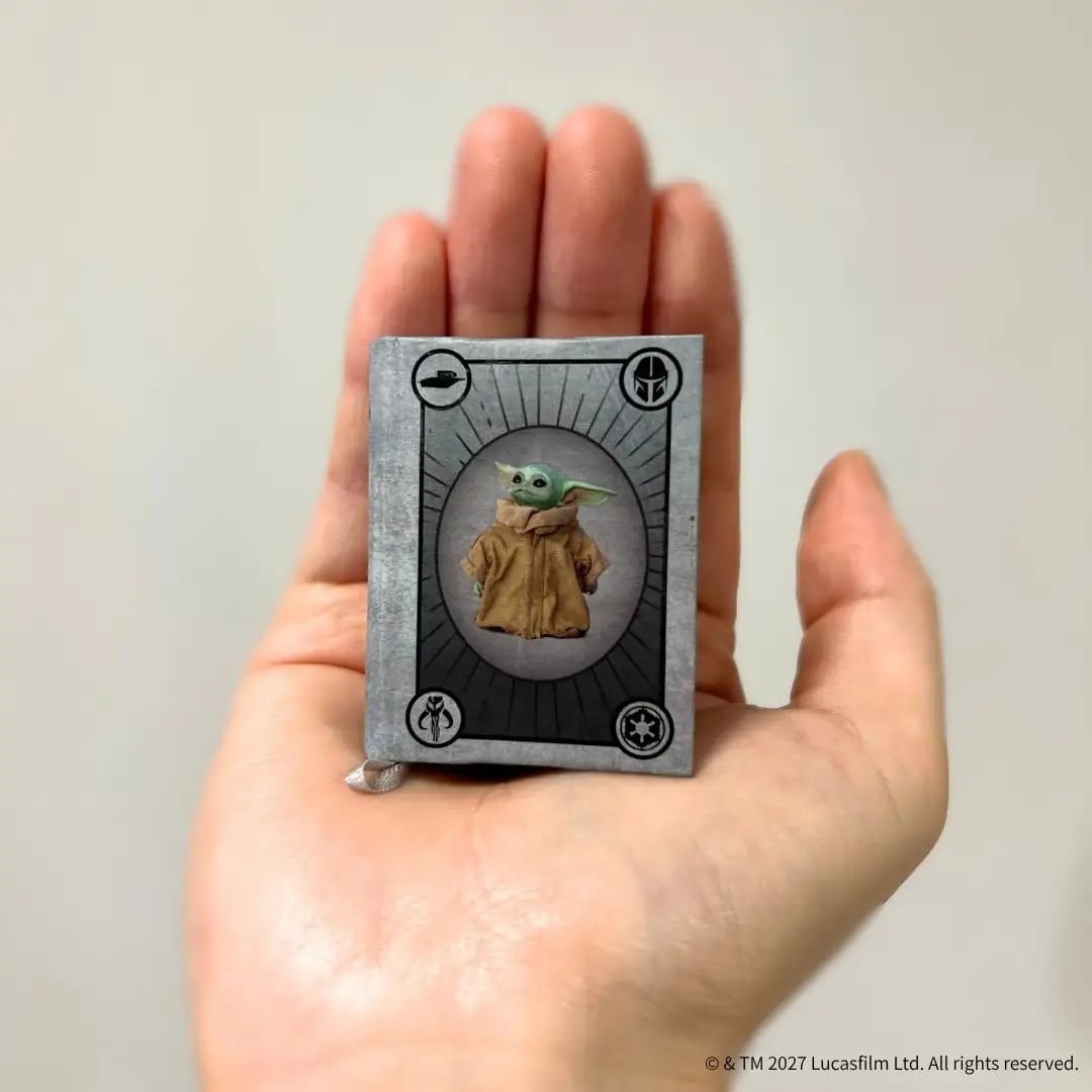 Miniature book measuring 51×38×15 mm