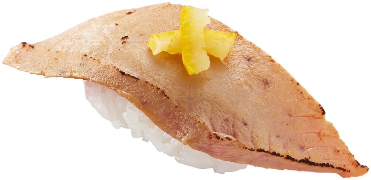 Enjoy the same price for a piece of toro with seared fatty tuna, topped with toro bits, ¥270 per piece (tax included ¥297)