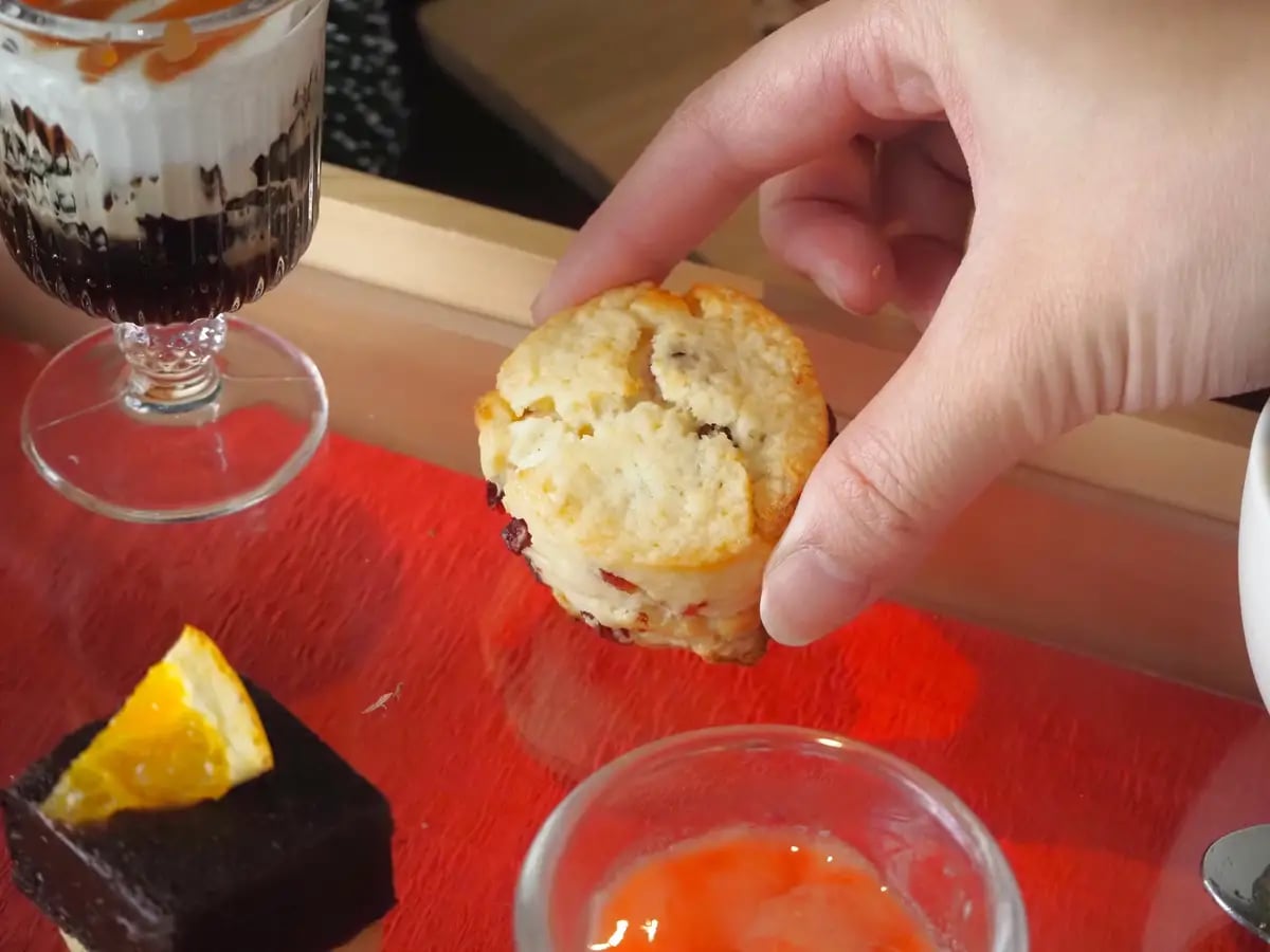 White Chocolate & Cranberry Scone. A scone that highlights the sweetness of white chocolate, made without added sweeteners for a pure flavor. The subtle sweetness is accented with tart cranberries.