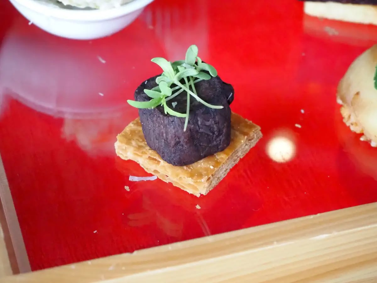Beef Brascato — Mini Meat Pie. Slow-cooked beef with red wine and aromatic vegetables, placed in a flaky pie crust. Enjoy the rich beef flavor and crispy pastry texture developed through slow cooking.