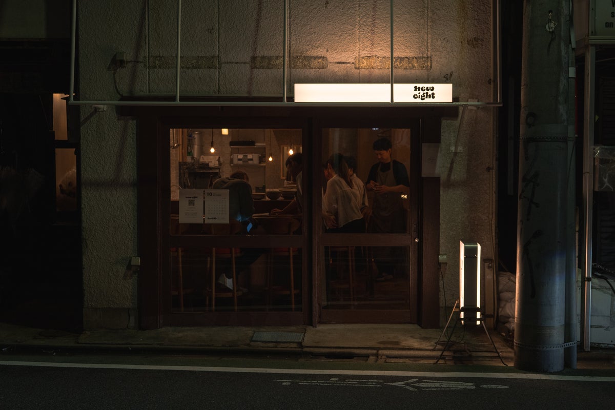 A 7-minute walk from Gakugei Daigaku Station. At night, the shop lights spill out onto the street.