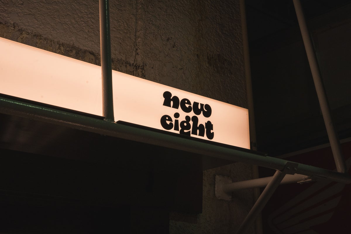 The newly lit 'new eight' logo.