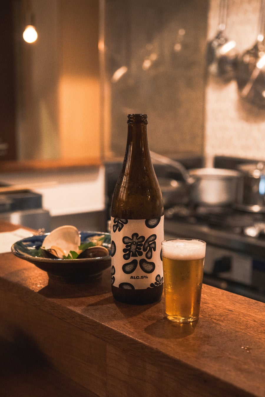 Bottled beer crafted by Derailleur Brew Works. A unique flavor you can only find at new eight.