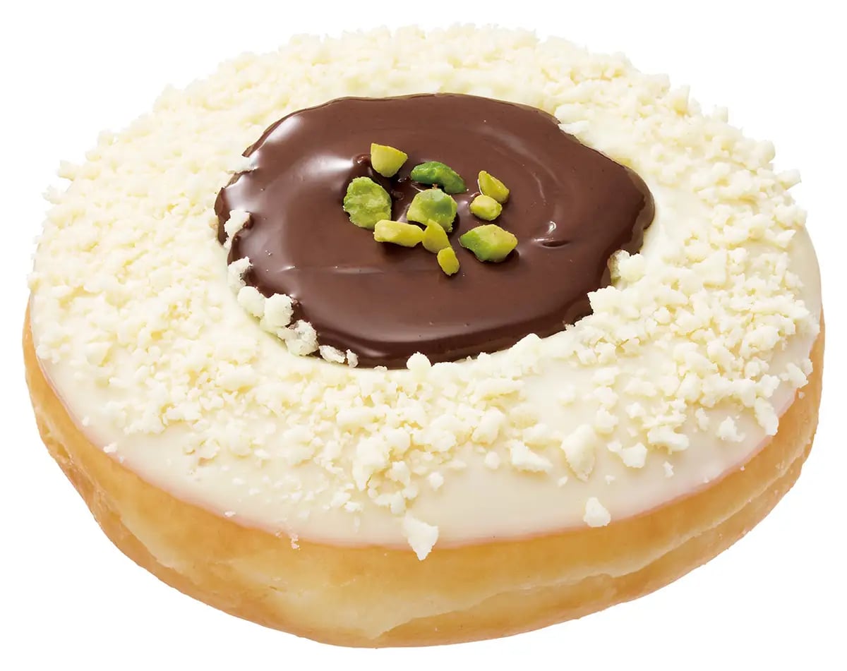 'White Chocolate Tart with NUTELLA®' is available from November 1, 2026, until late November, while supplies last. Price: ¥410 (tax included), ¥418 (eat-in). This donut features a milky white chocolate coating, crunchy ring, and a biscuit embedded in the center, topped with hazelnut-flavored chocolate spread Nutella® and pistachios.