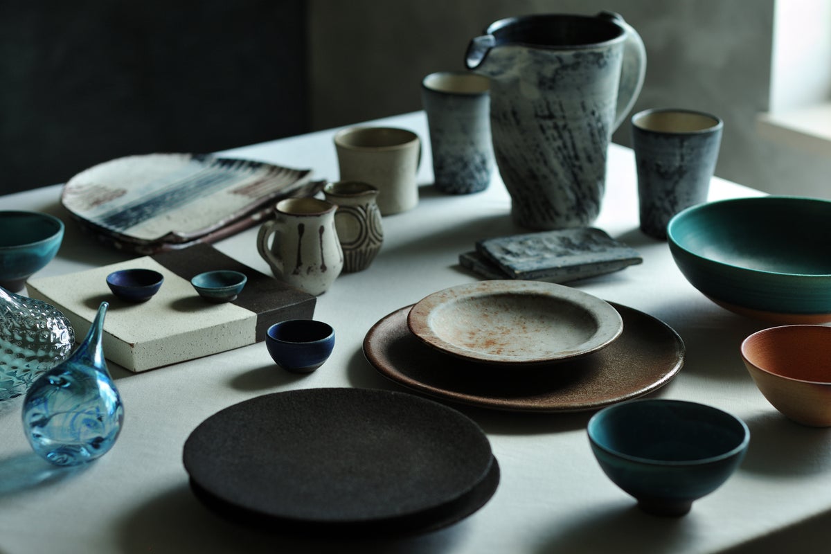 Dishes are complemented by pottery and sculptures by local artists.