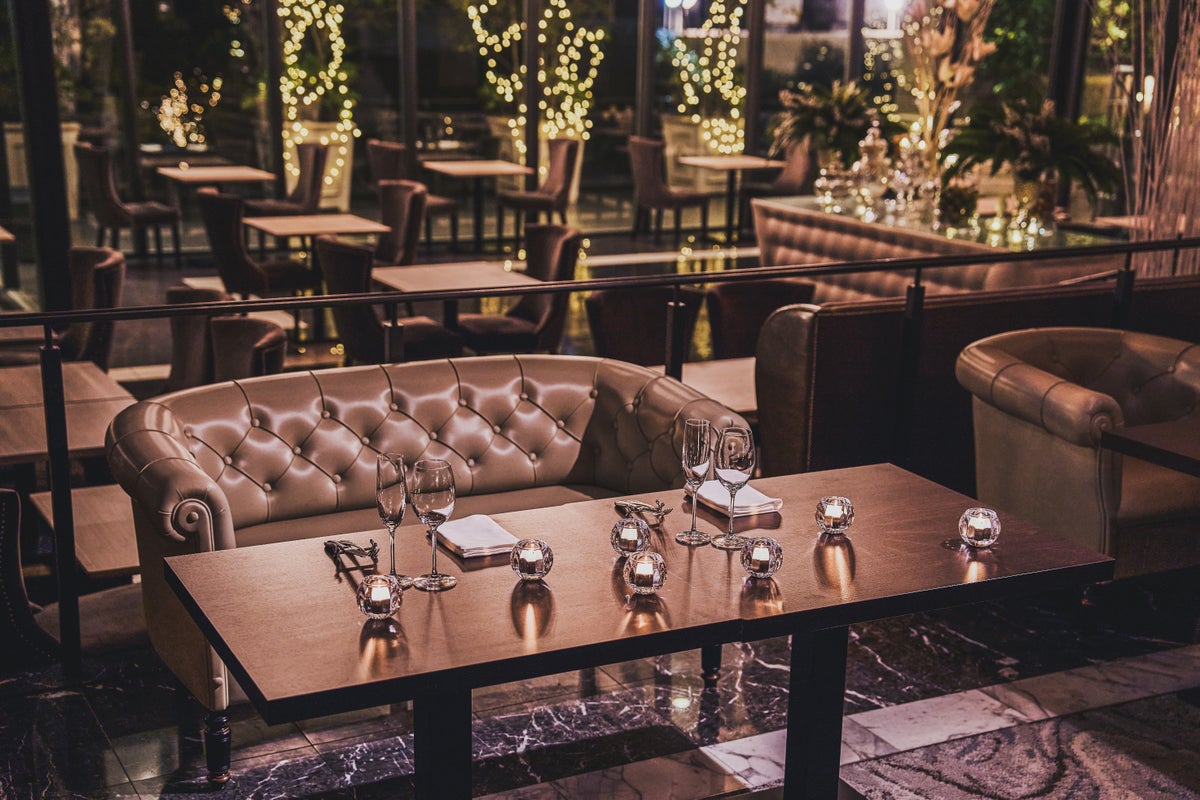 Image of the sofa seating area, offering a comfortable dining option.