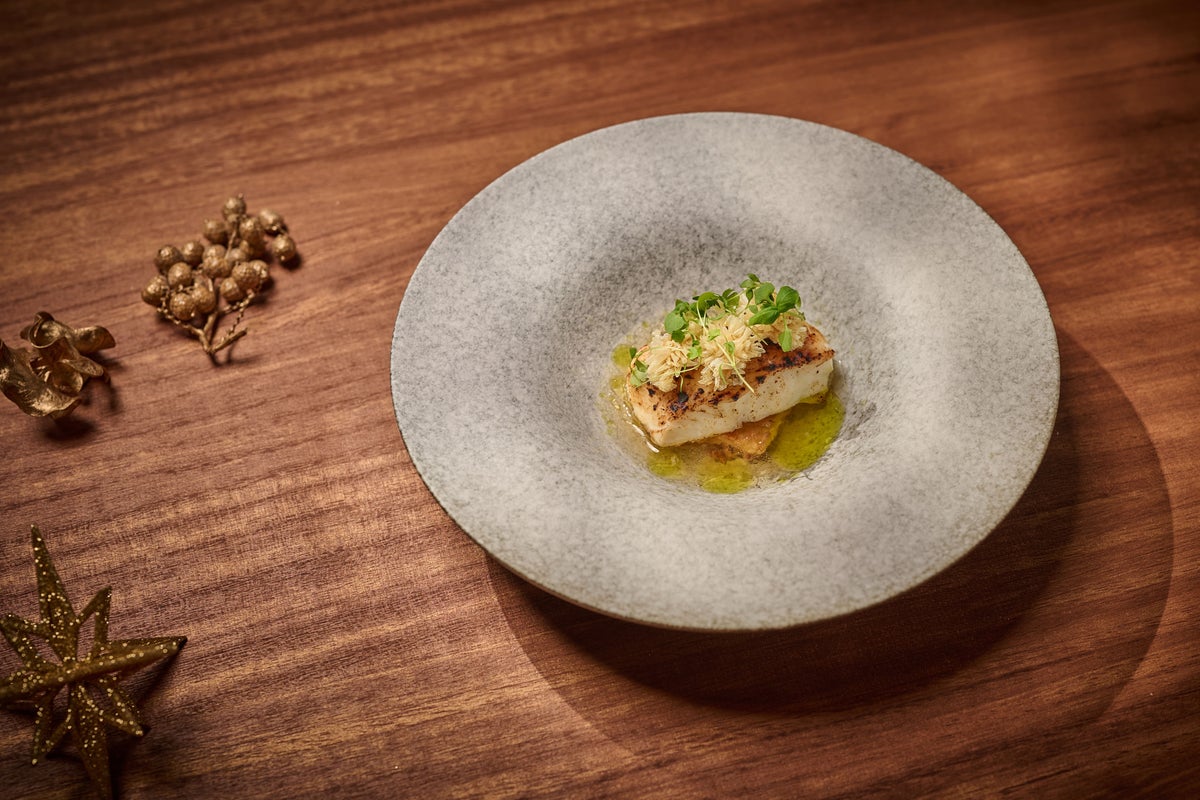 Amuse Bouche, Horse Meat Tartare with Root Celery Tartlet, Sea Urchin French Toast. The course begins with two different